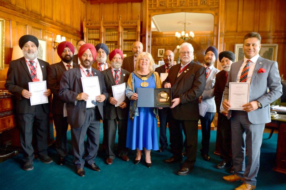 Members receive certificates and trophies from the Lord Mayor of Bradford.